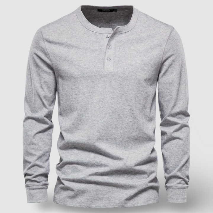 Comfortable men's long sleeve henley shirt with button placket, ideal for everyday outfits.