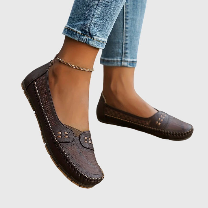Orthopedic slip-on women's shoes, lightweight & breathable, ensures all-day walking comfort.