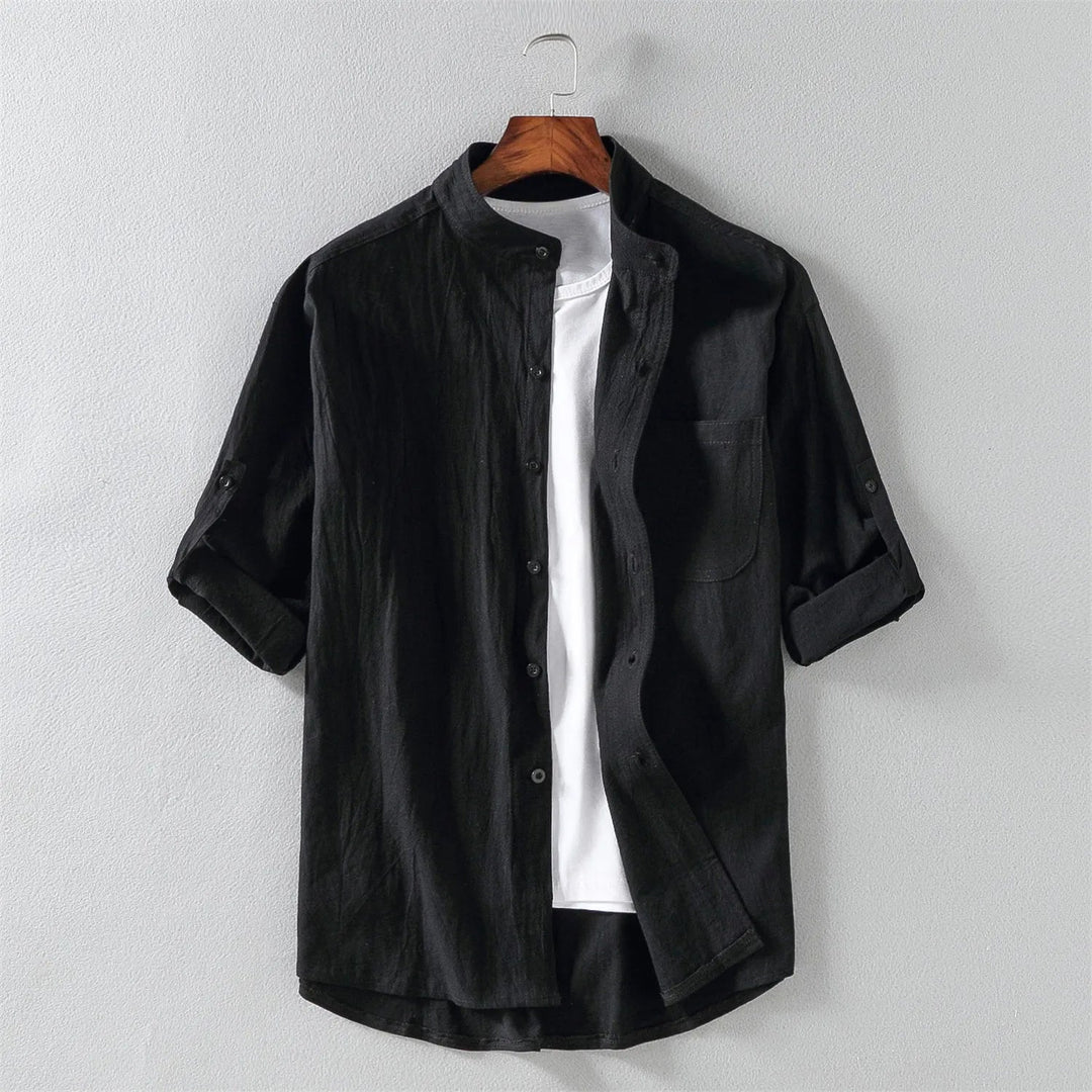 Breathable men's long-sleeve cotton button-up shirt, ideal for versatile casual wear.
