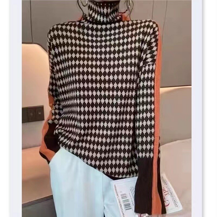 Women's chic turtleneck sweater, a cozy & stylish knit pullover. Elegant top for versatile autumn & winter wear.