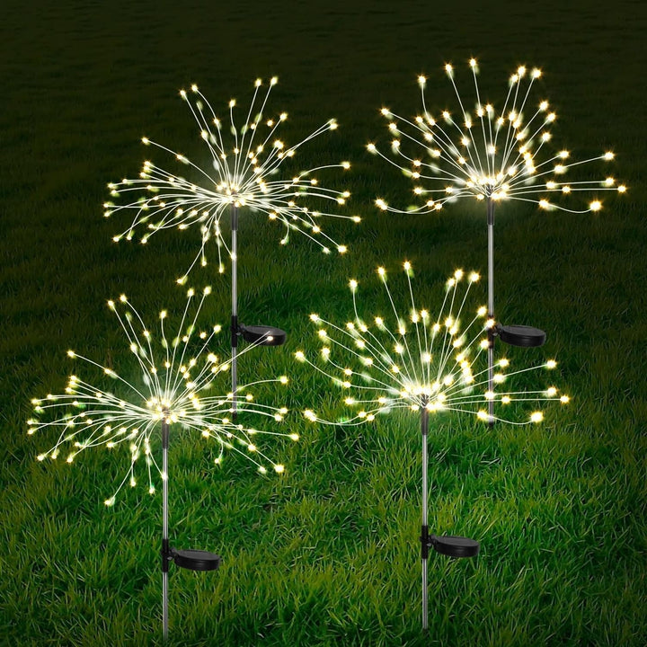 Detailed view of glowing solar LED firework garden lights, perfect for night outdoor decor