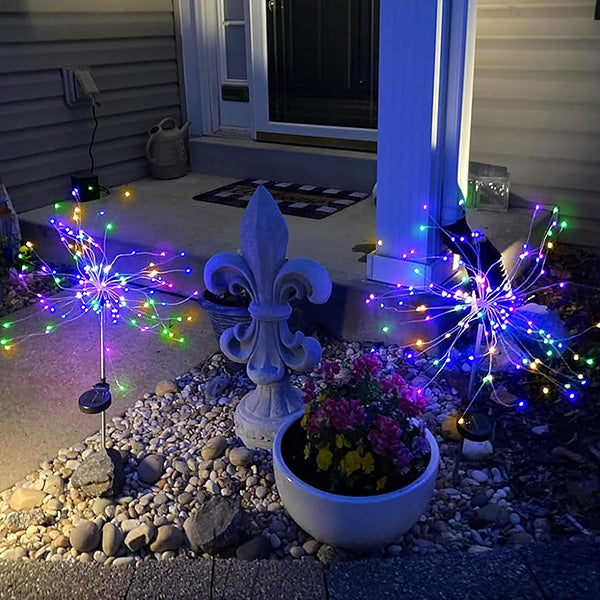 Solar-powered firework lights creating a magical ambiance in a garden, patio decor