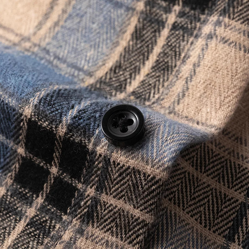 Versatile men's relaxed fit plaid flannel shirt, a button-down layering essential for winter.