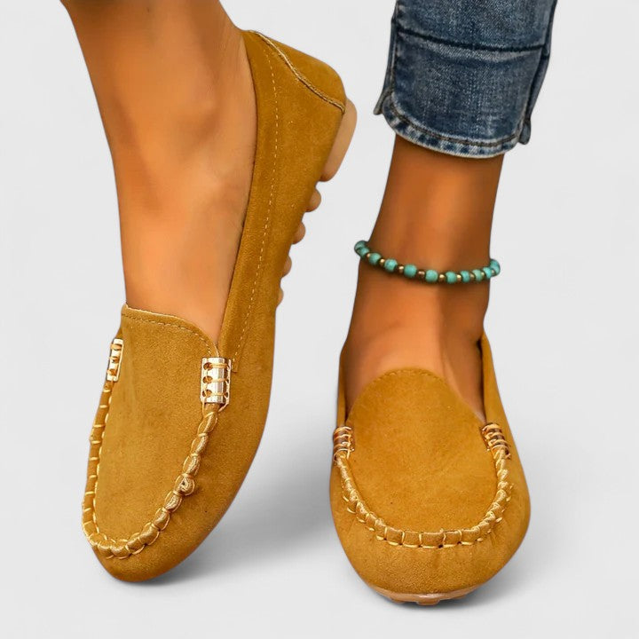 Fashionable women's slip-on loafers, orthopedic comfort meets modern style with metal embellishments.