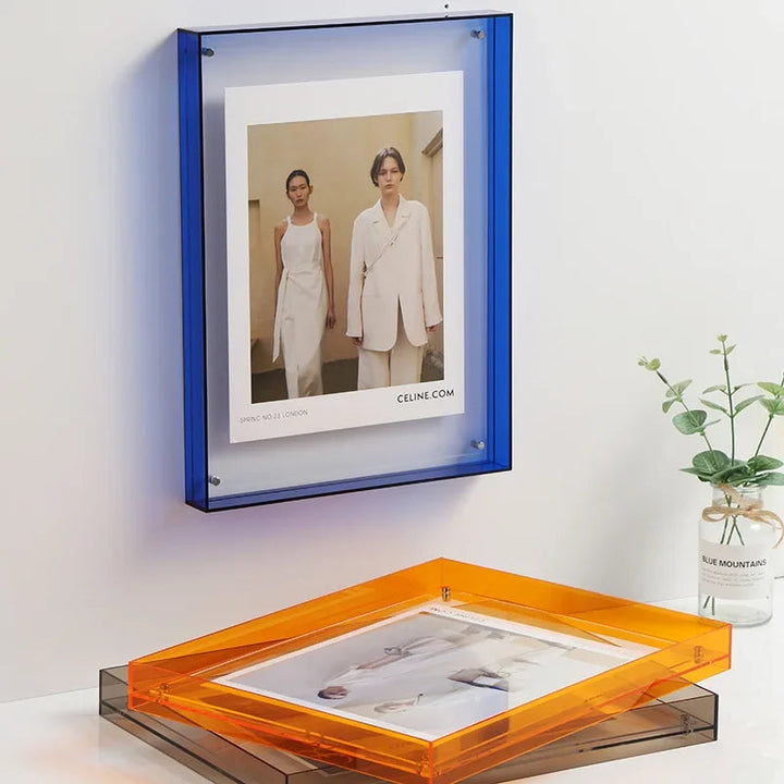 Sleek modern acrylic photo frame, ideal for stylish wall decor or desk art display.