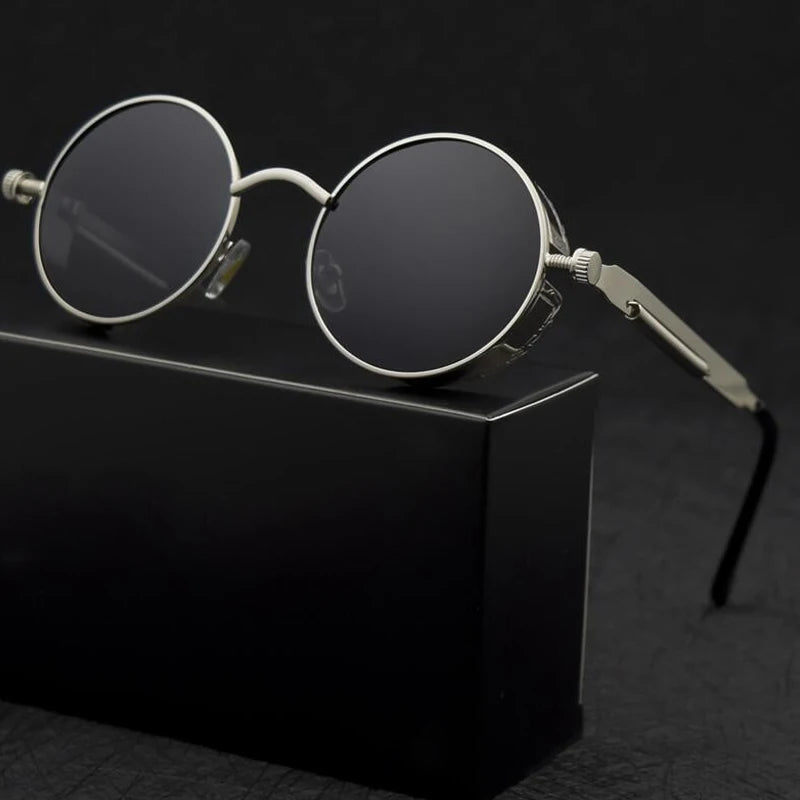 Comfortable & lightweight round unisex sunglasses. Features a durable aluminum alloy frame & UV protection lenses.