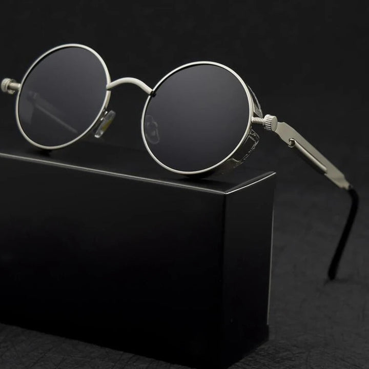 Comfortable & lightweight round unisex sunglasses. Features a durable aluminum alloy frame & UV protection lenses.