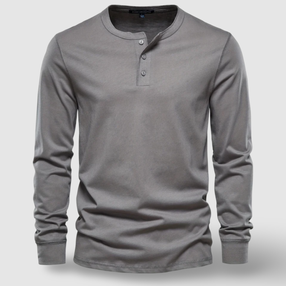Classic men's solid long sleeve henley, great for layering or standalone casual looks.