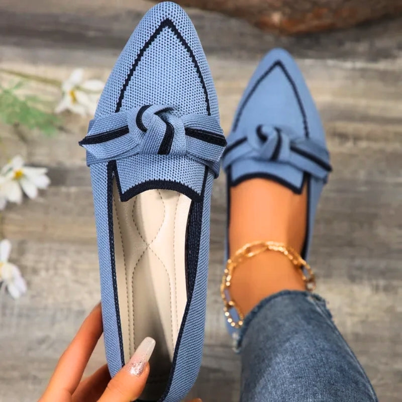 Beige women's comfortable ballet flats, designed with arch support for all-day wear.
