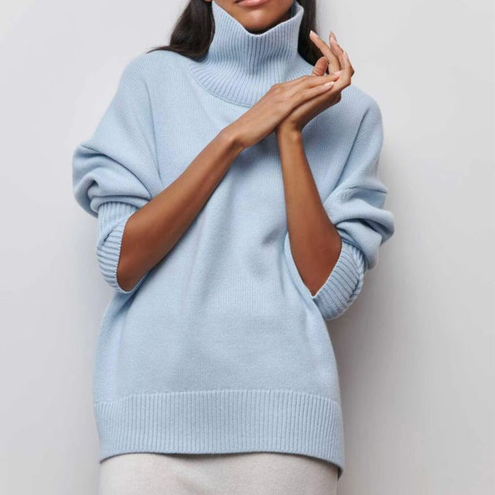 Soft knit, oversized women's turtleneck sweater. Cozy, comfortable for fall and winter style.