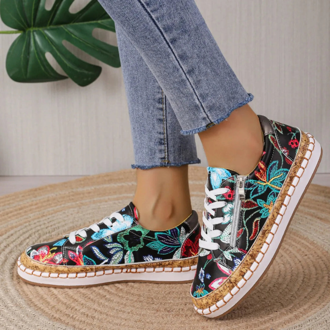 Stylish women's black floral lace-up flats, perfect for comfortable spring and summer fashion.