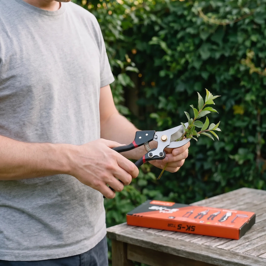 5-piece essential garden tool set for pruning, trimming, & plant care. Includes shears, saw, & hand tools.