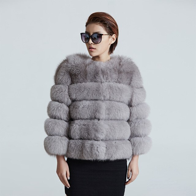 Soft plush women's short winter jacket, a warm and fashionable piece perfect for cold weather layering.