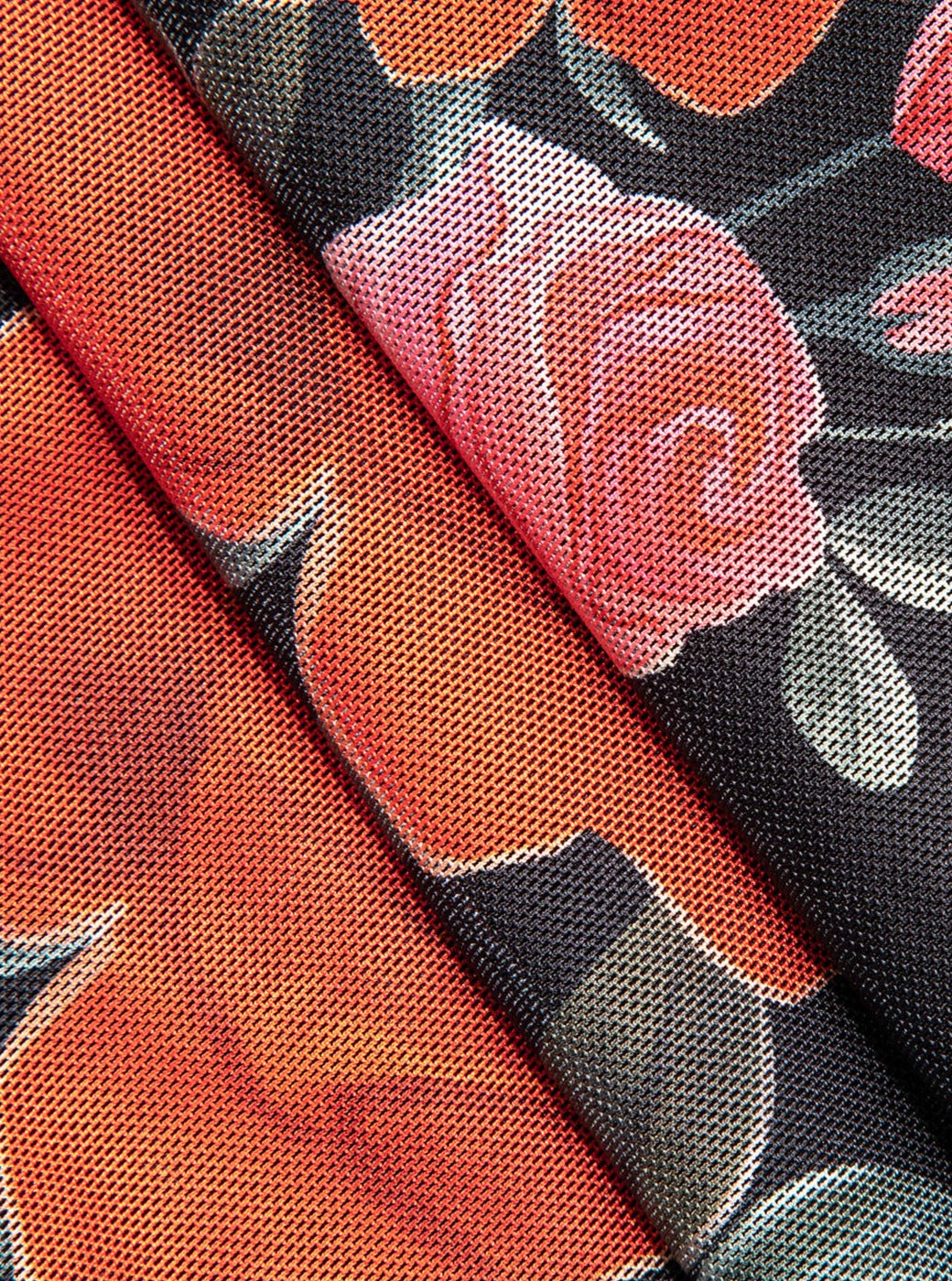 Women's long floral maxi dress, designed with spaghetti straps for a breezy and elegant summer outfit.