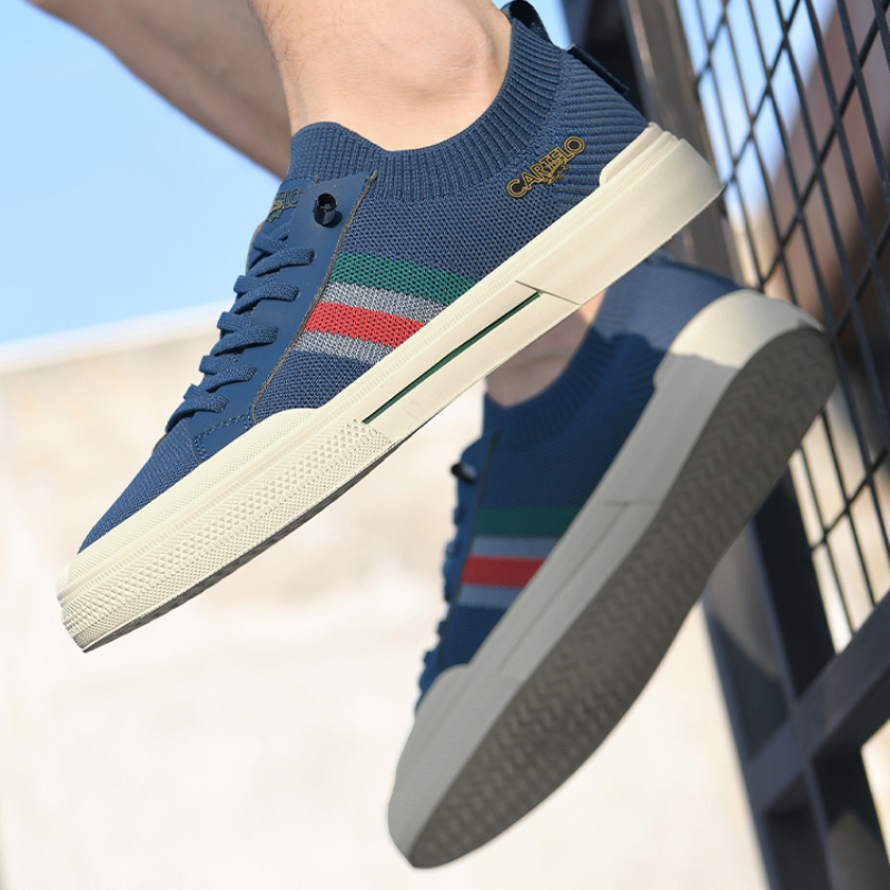 Close-up of lightweight fabric on men's comfort sneakers, ideal for everyday wear.