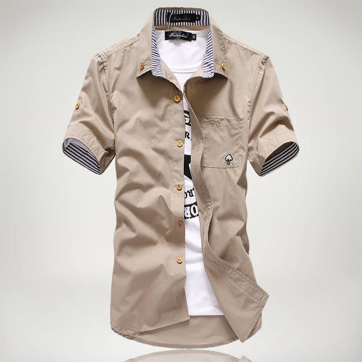 Men's button-up short sleeve shirt, comfortable cotton with eye-catching contrast stitching.