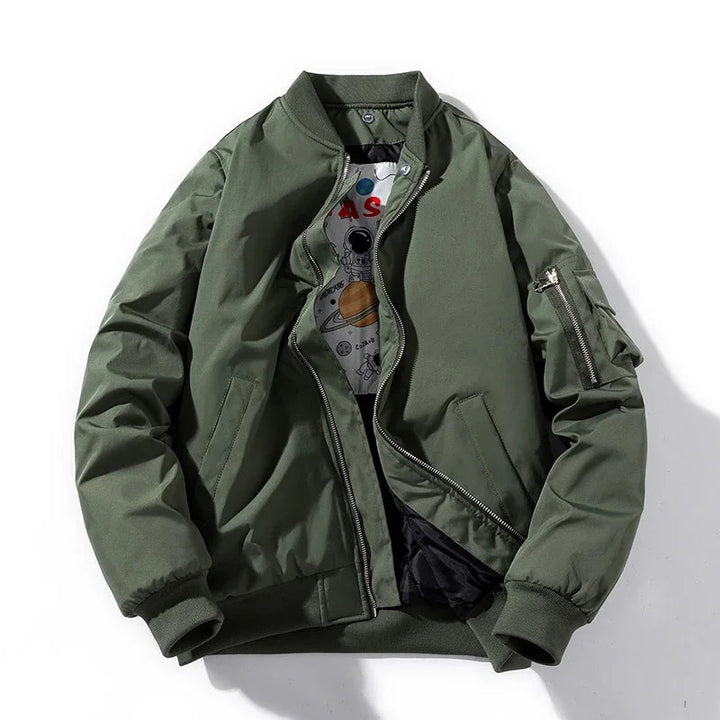 Stylish men's Astro bomber jacket revealing unique graphic lining. An essential layering piece for men.