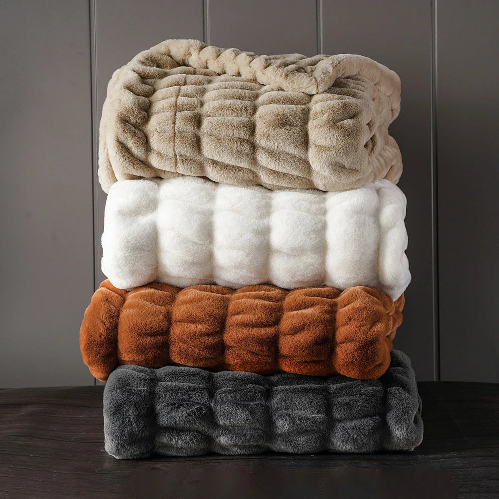 Luxurious faux fur throw blanket, incredibly soft & cozy for living room or bedroom decor.