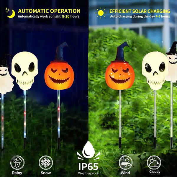 View of a Halloween ghost solar LED ground light amongst autumn leaves in a garden