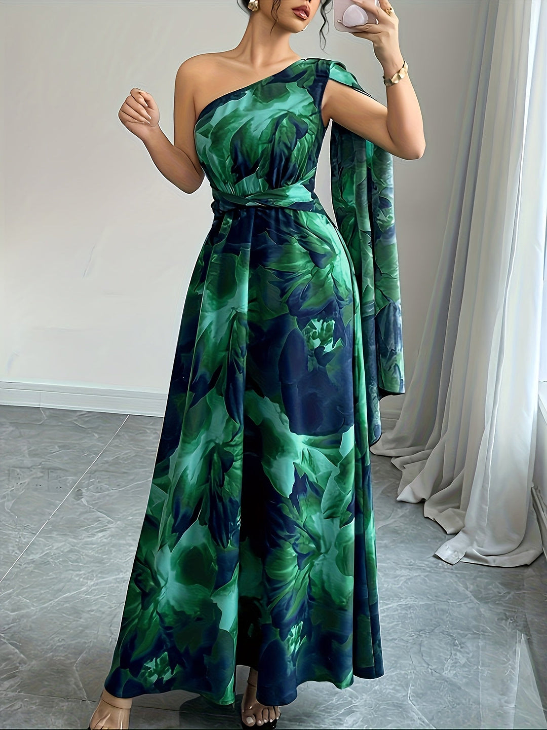 Flowing one-shoulder women's maxi dress. Elegant formal dress, ideal for wedding guests & evening parties.