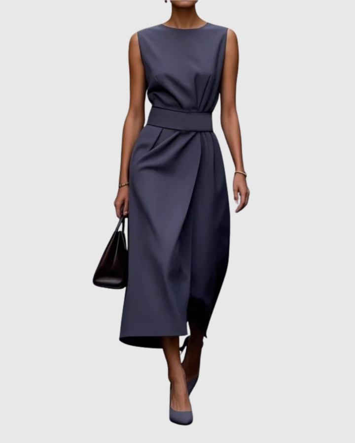 Modern women's sleeveless round neck midi dress. Features a stylish below-knee cut and convenient side zip.