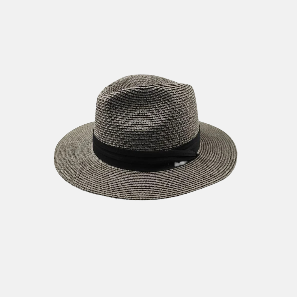 Stylish unisex wide brim Panama style straw hat, perfect beach, travel, and vacation wear with excellent sun protection.