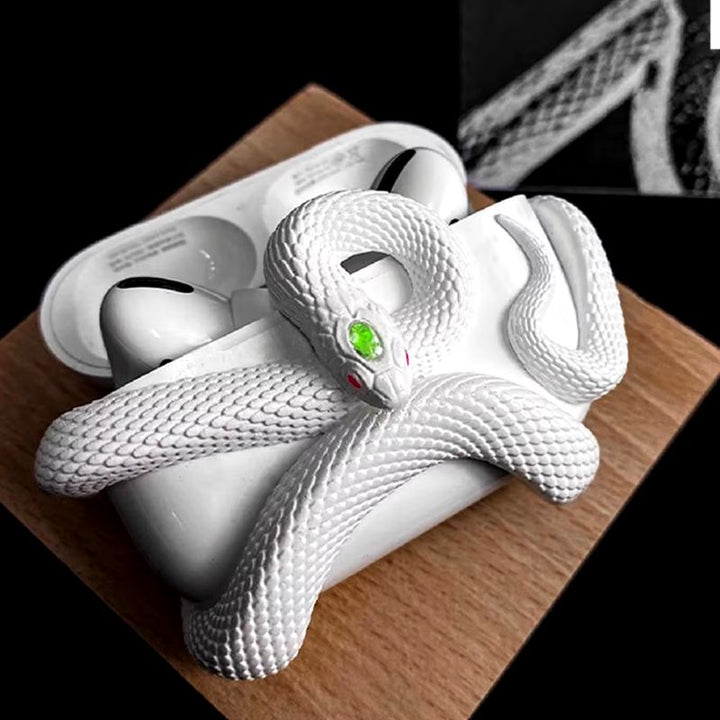 Pink serpent-style earbud case, a durable and scratch-resistant protective wireless accessory with unique design.