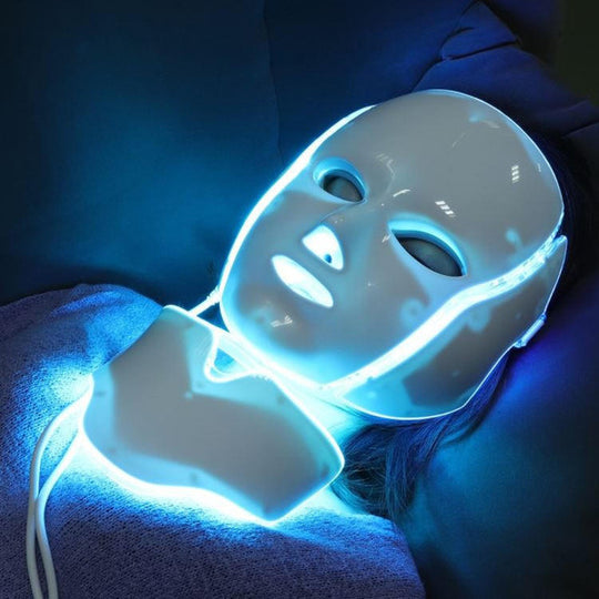 Relaxing home spa facial treatment with 7-color LED light therapy mask. Enjoy professional skincare.