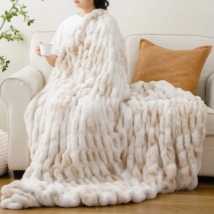 Premium faux fur throw blanket, ultra-soft and luxurious for elegant home decor.