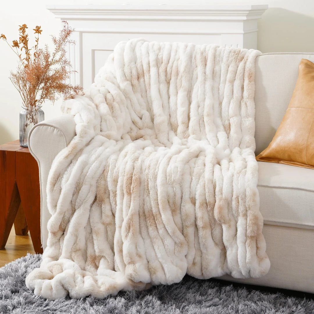 Washable faux fur throw blanket, luxurious, soft & plush for easy care and home comfort.