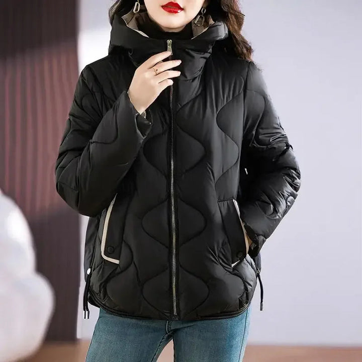 Stay warm & fashionable in this women's chic insulated puffer jacket, perfect for cold weather.
