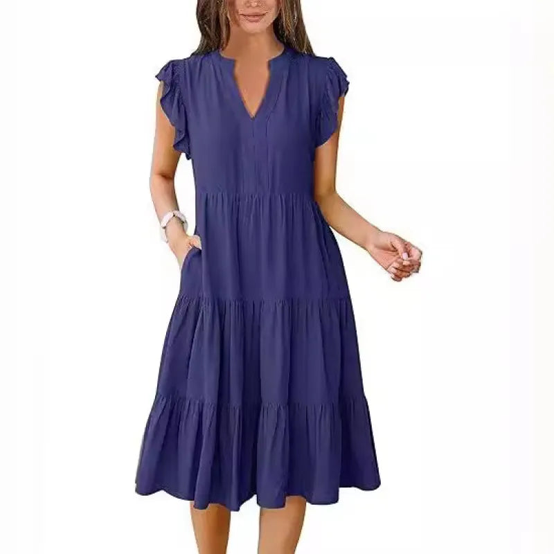Comfortable women's tiered midi dress, ideal for casual wear, showcasing flutter sleeves & V-neck.
