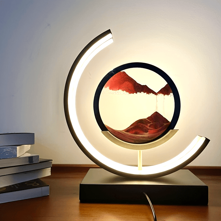 Calming LED hourglass lamp with flowing sand art, ideal for ambient lighting & relaxation.
