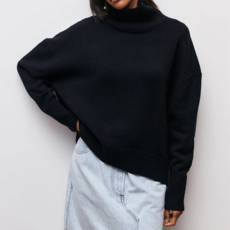 Versatile women's oversized knit turtleneck sweater. Comfortable casual wear for fall and winter.