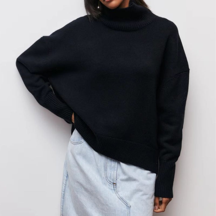 Versatile women's oversized knit turtleneck sweater. Comfortable casual wear for fall and winter.