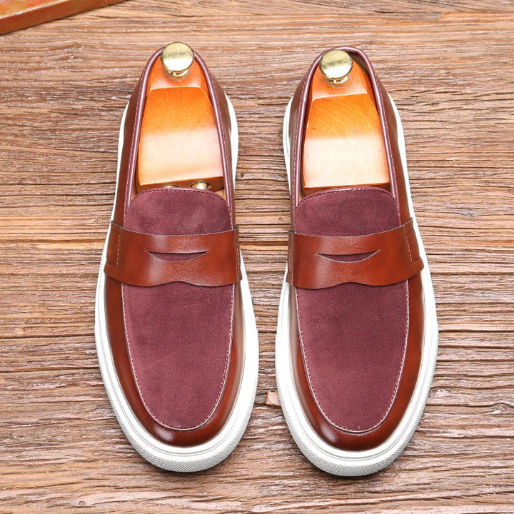 Close-up of Men's Kensington classic slip-on loafers, highlighting sophisticated design & premium quality.