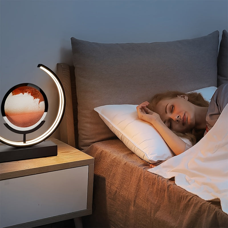 Ambient LED hourglass lamp with soothing flowing sand art, enhances home atmosphere.