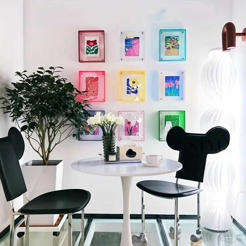Freestanding acrylic picture frame, modern table display for photos, home & office decor.