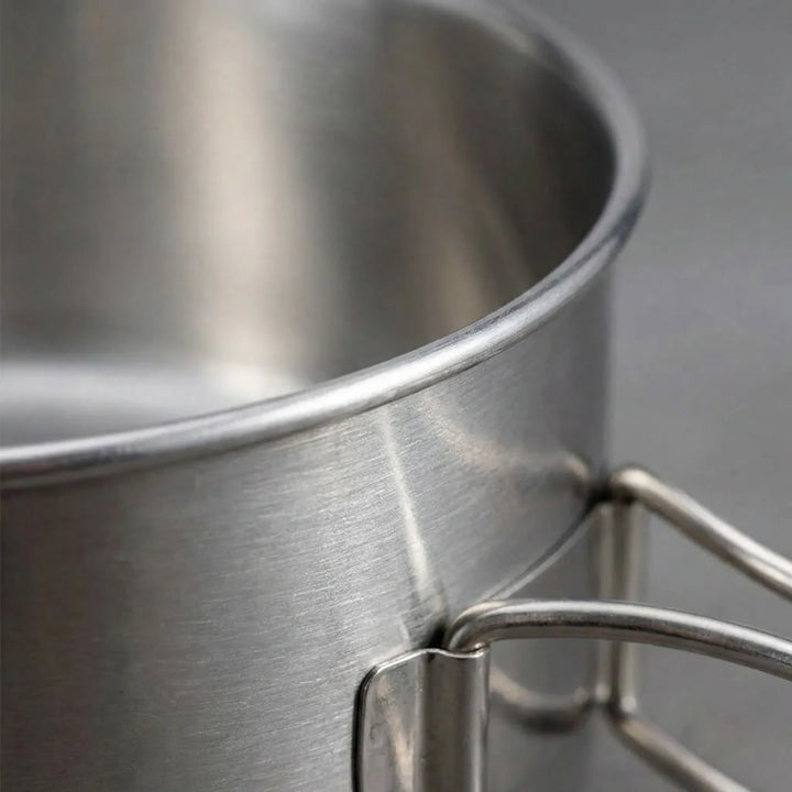 Unisex 8-piece camping cookware set, silver metal for outdoor cooking. Essential portable kitchen & hiking gear.
