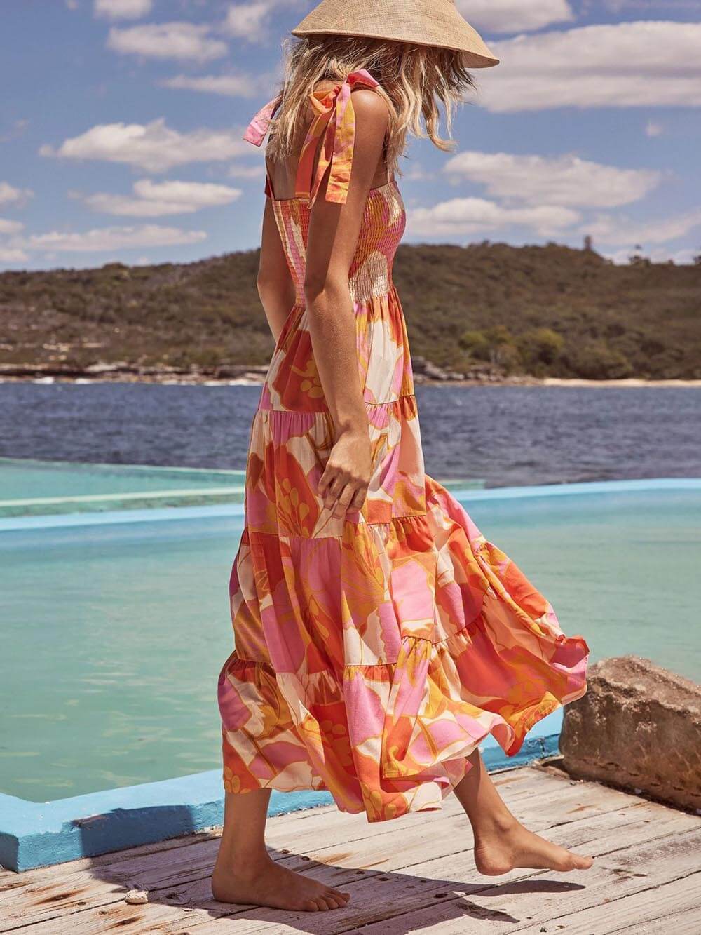Effortless multicolor women's halter midi sundress for summer. Stylish sleeveless design for casual comfort and elegance.