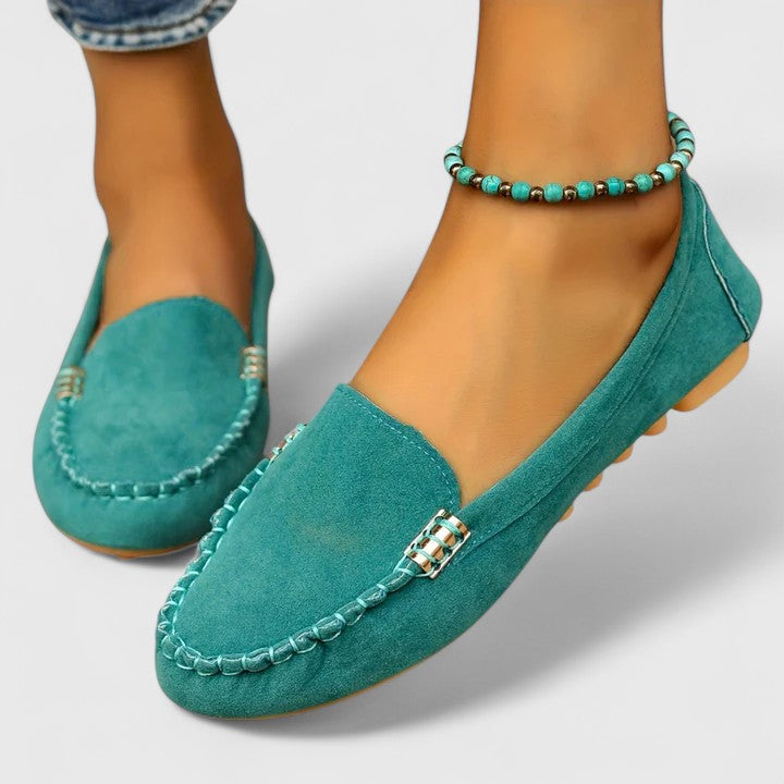 Supportive women's slip-on loafers featuring metal detailing, perfect for comfortable daily fashion.