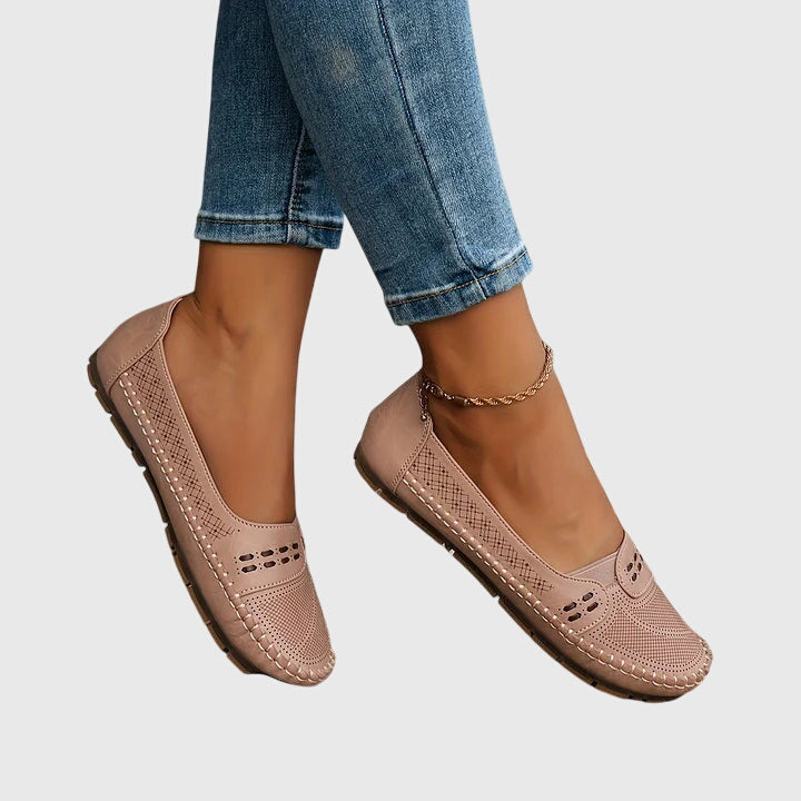Women's easy wear orthopedic slip-on shoes, offering foot support and breathable comfort.