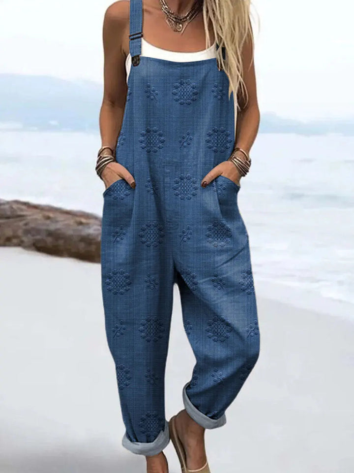 Women's relaxed fit patterned jumpsuit with wide legs, perfect for comfortable and stylish spring/summer everyday wear.