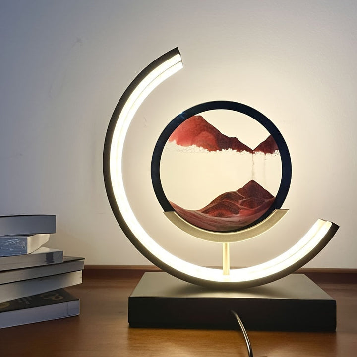 Unique gift: LED hourglass lamp with mesmerizing flowing sand art, adds elegance to any room.