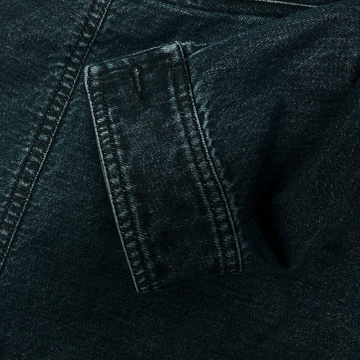 Slim fit men's blue denim jacket featuring a vintage wash, distressed details, and a stylish stand collar.