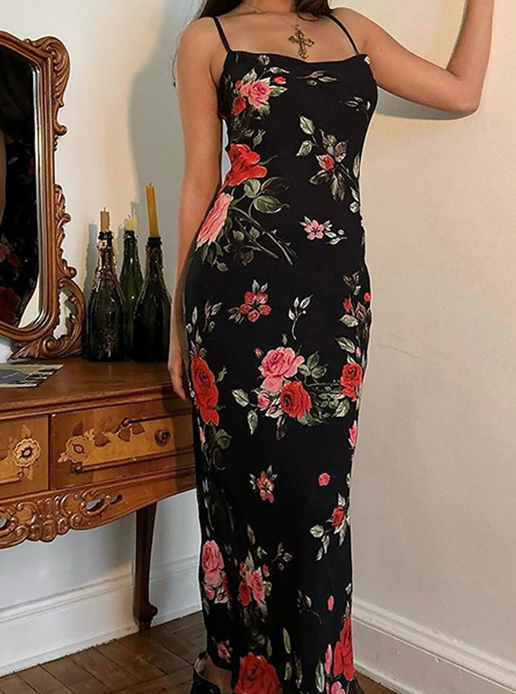 Flowy women's summer maxi dress featuring a beautiful floral print and delicate spaghetti straps.