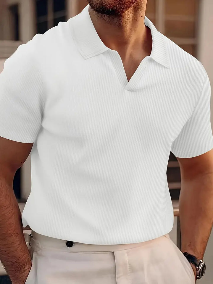 Men's short sleeve ribbed polo shirt in a slim fit, an essential summer shirt for versatile casual and smart casual styling.