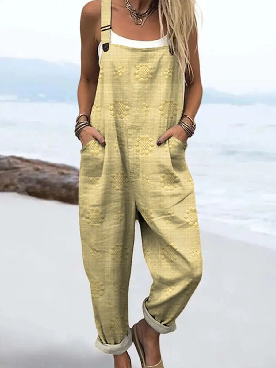 Women's versatile patterned wide-leg jumpsuit, relaxed fit with pockets, offering stylish comfort for spring/summer.