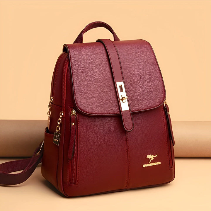 Elegant women's PU leather rucksack, a versatile fashion backpack for daily errands & professional settings.