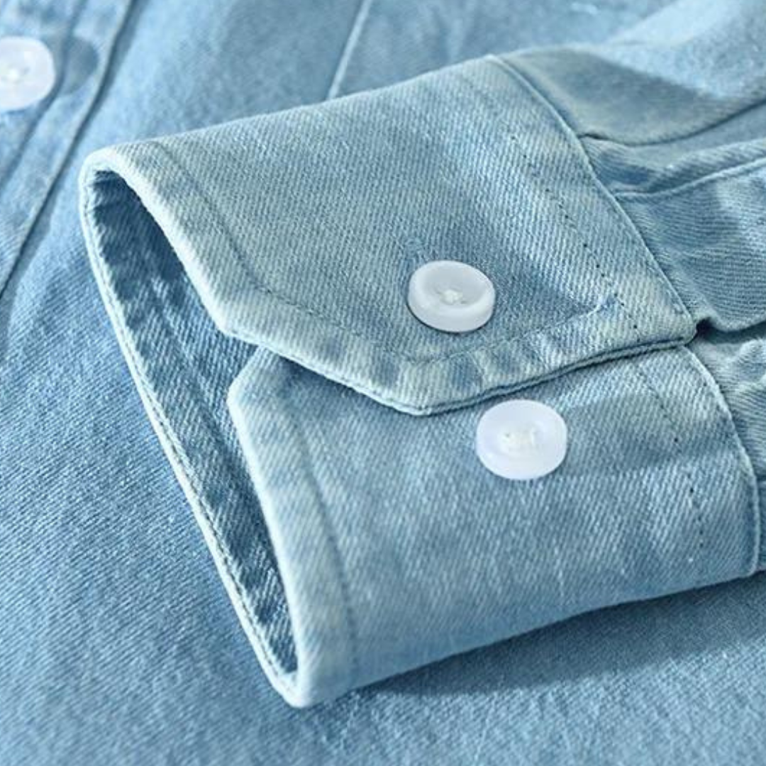 Fashionable men's black long sleeve denim shirt, a versatile button-down in a modern fit for casual style.